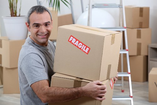 Professional flat removals planning in Ruxley with moving boxes and apartment access